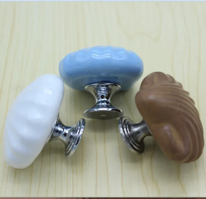 القوقع شكل كارتون الأطفال غرفة السيراميك المقابض ، أزرق أبيض مكتب السيراميك درج خزانة خزانة مقابض التأثيرات المقابض الاطفال المقبض