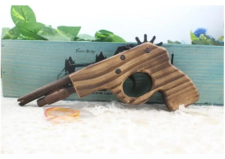 

Hot Sale Toy Guns 2017 Wooden Toy Rubber Band Bullet Guns Weapon Pistol Pistola de Brinquedo Slugterra Toys Pistola Juguete