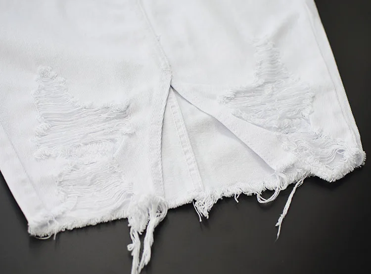 European and American women's high waist bag hip half body skirt irregular wear tassels pure white front slit sexy wild (12)