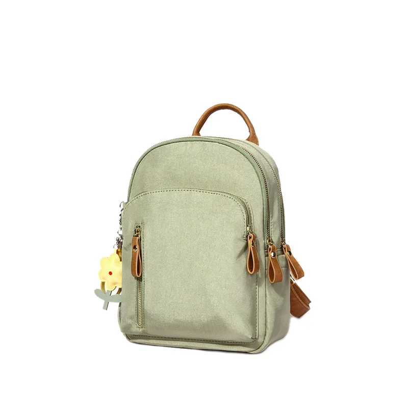 

Mochilas mujer 2018 new fashion backpack small fresh female backpack simple small flower pendant