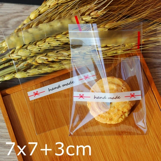 

Small Transparent handmade bowknot Self Adhesive Seal packing bags ,packing bag,food packing bags 300pcs/lot