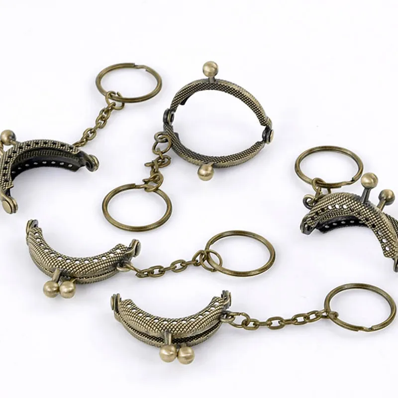 

10Pcs High Quality Antique Bronze Tone Vintage Clutch Coins Purse Metal Arc Frame Kiss Clasp Key Ring Handbag Handle 4.2x3.5cm