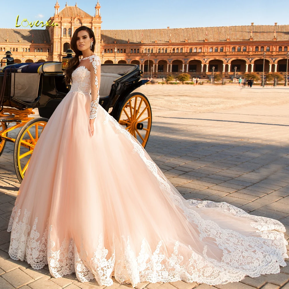 

Loverxu Sexy Illusion Long Sleeve Ball Gown Wedding Dresses 2019 Luxury Appliques Button Court Train Lace Vintage Bridal Gowns