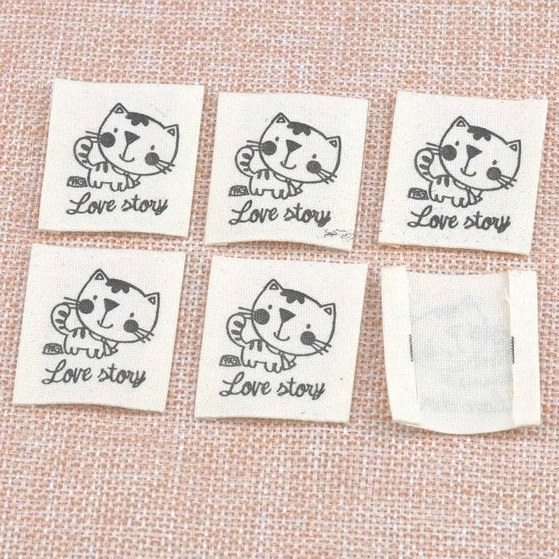 50pcs Beige Woven Labels For Clothing Care Labels Cartoon Cat ...