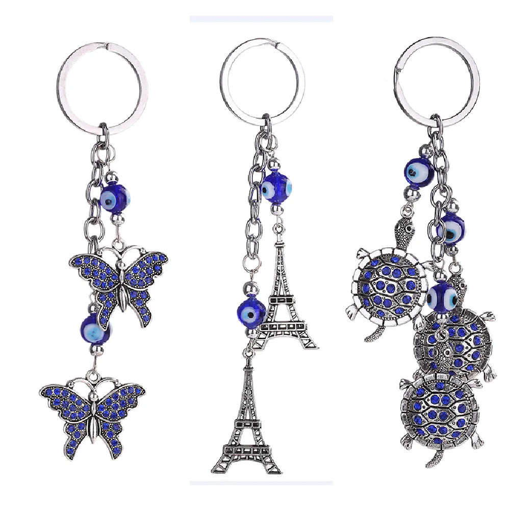 

Blue Evil Eye butterlfy Eiffel Tower Tortoise Charm Protection Tassel Hanging Crystals Keychain 1pc