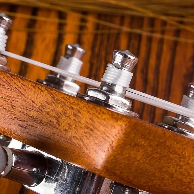 нейлоновые струны s328. нейлоновые струны для акустической гитары. белые струны на гитару. гитара с нейлоновыми струнами. белые струны на гитару.