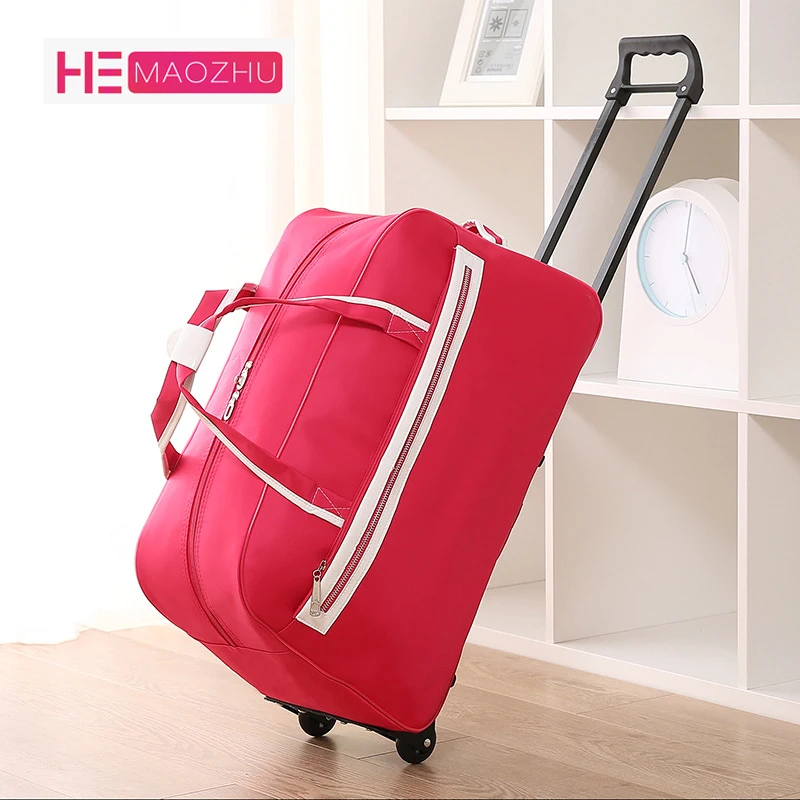 

Solid color Oxford cloth Korean version of the trolley bag luggage handbag waterproof large capacity with roller trolley luggage