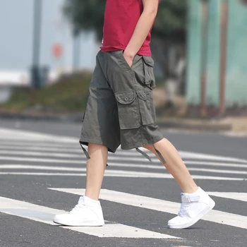 

2020 new cotton summer casual overalls shorts pocket solid large size knee length male fat outside shorts men