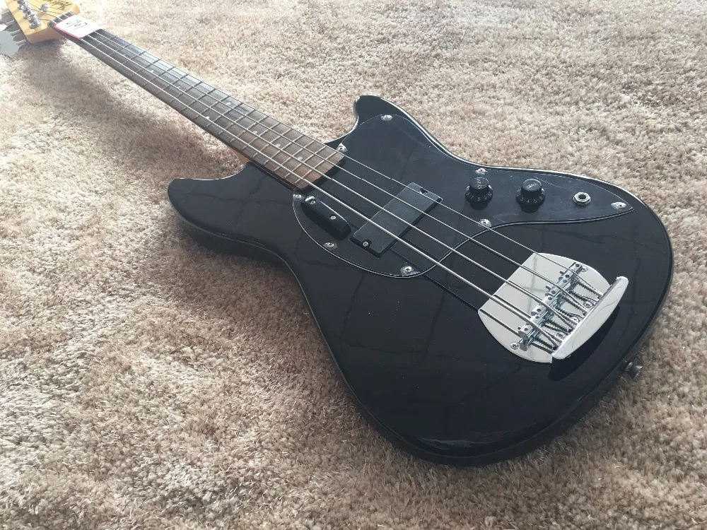 4 string bass guitar Glossy black color Bolt on neck Rosewood