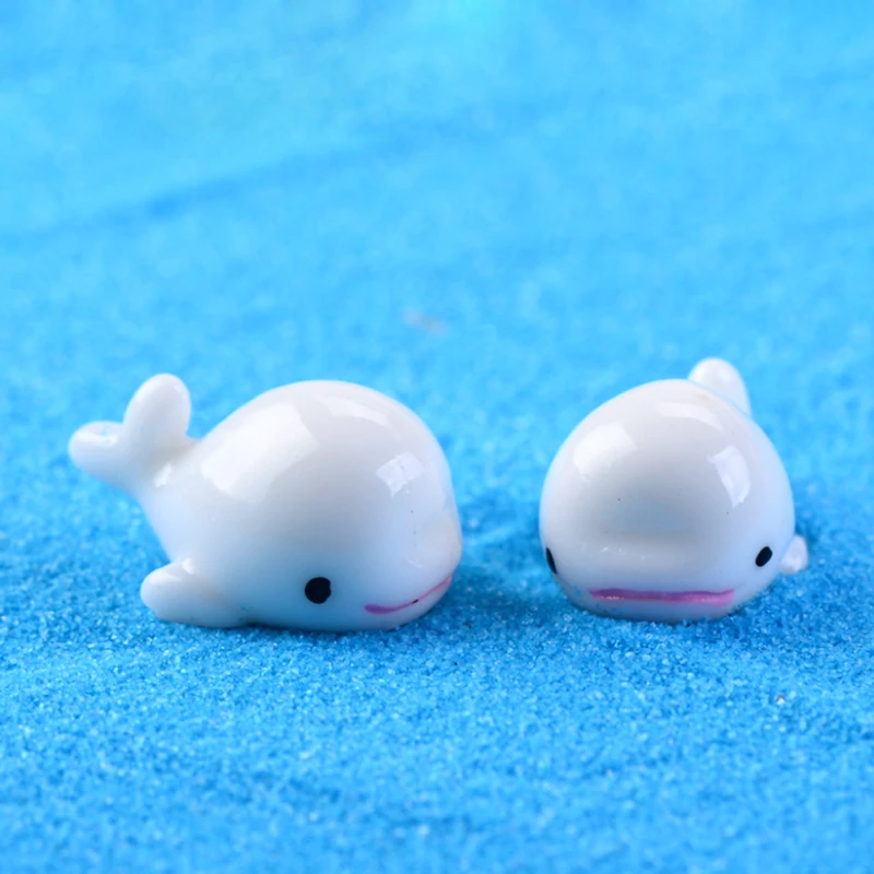 

White dolphins, blue dolphins, moss landscapes ornaments, resin ornaments handicrafts.