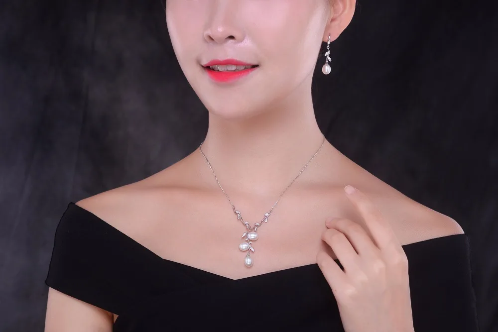 drop earring and necklace sets in silver