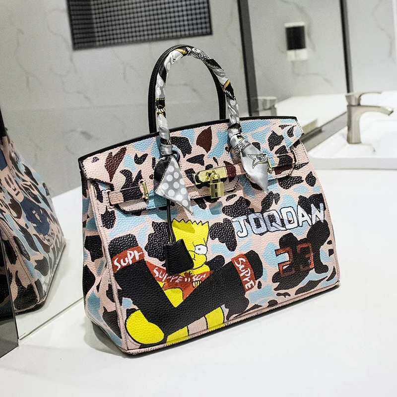 

2019 Summer Luxury design Personality manual cartoon drawing package cartoon custom Portable large capacity bag PU leather 35CM