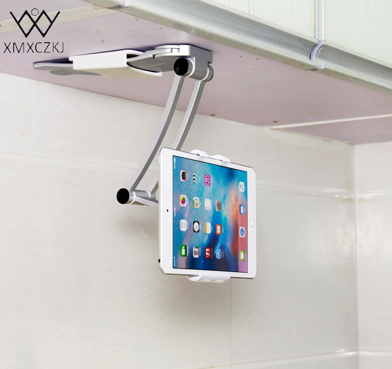 Price XMXCZKJ Tablet Stand Kitchen Wall Universel Mounted Tablet Wall Holder Cell Phone Holder 13.4 To 19 Cm Width For Iphone Xiaomi