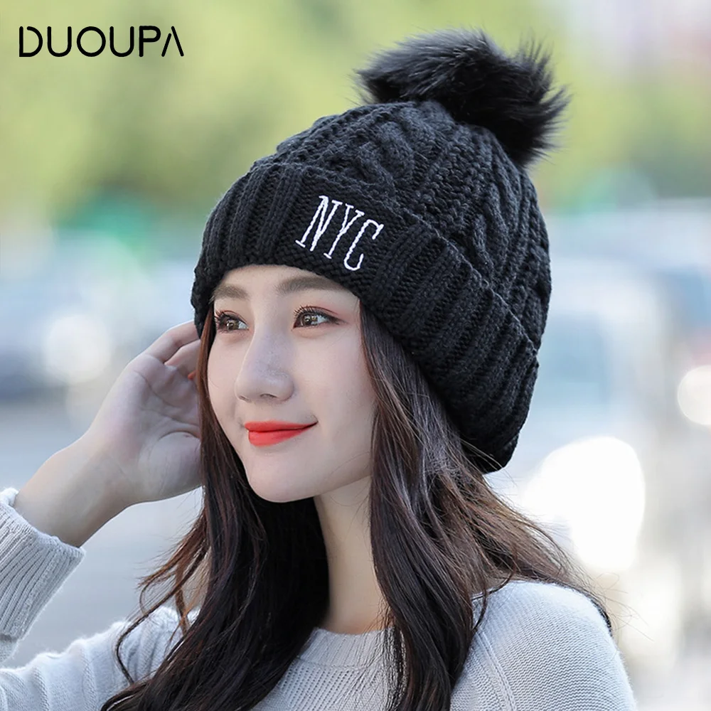 

Korean version of the new winter warming hat, single-color curling wool cap, big wool ball warming knitted cap