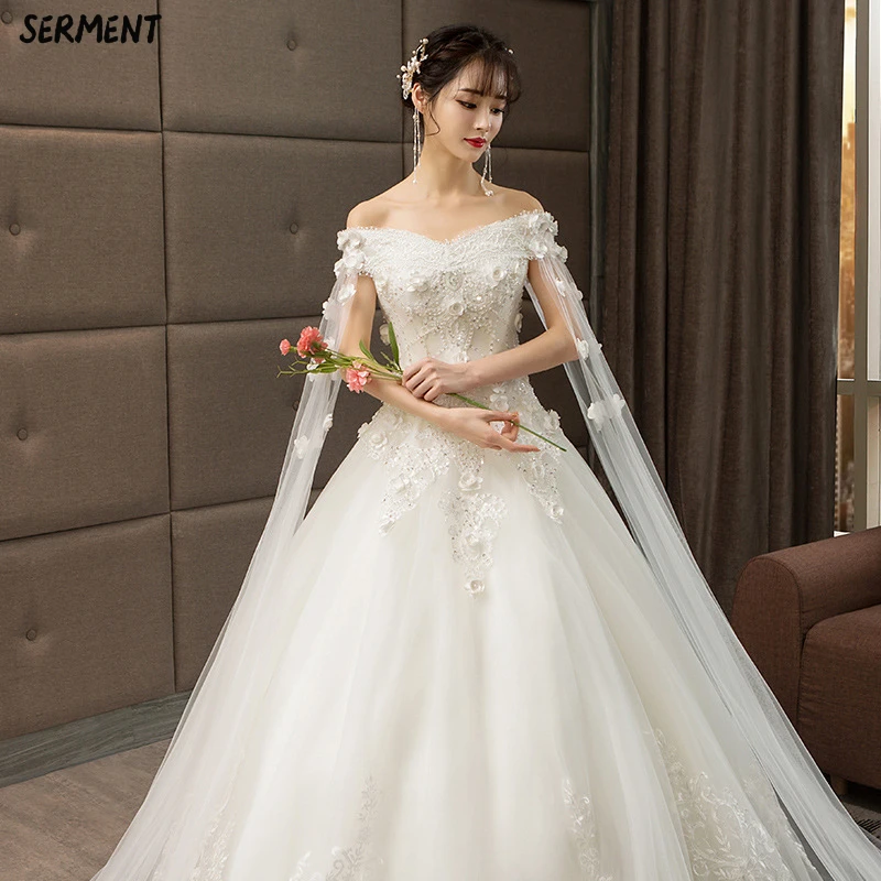 

2019 New Word Shoulder European and American Court Wedding Main Yarn Bride Dress Champagne Long Tail Summer