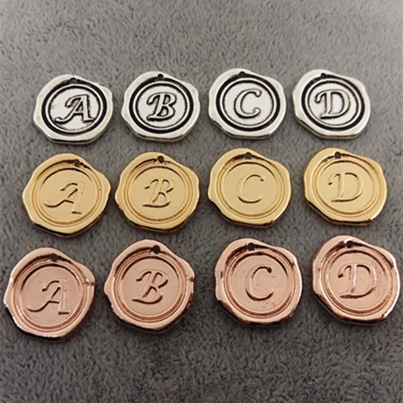 

130pcs/lot round Gold Disc Pendant Alphabet A-Z Letter Tag Charms Stamp Initial Jewelry,18mm Beads For Jewelry Making Wholesale