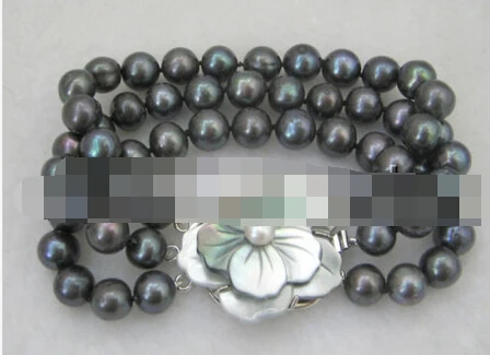 

FREE SHIPPING>>>@@ > 00957 3row black round freshwater pearl bracelet-shell clasp