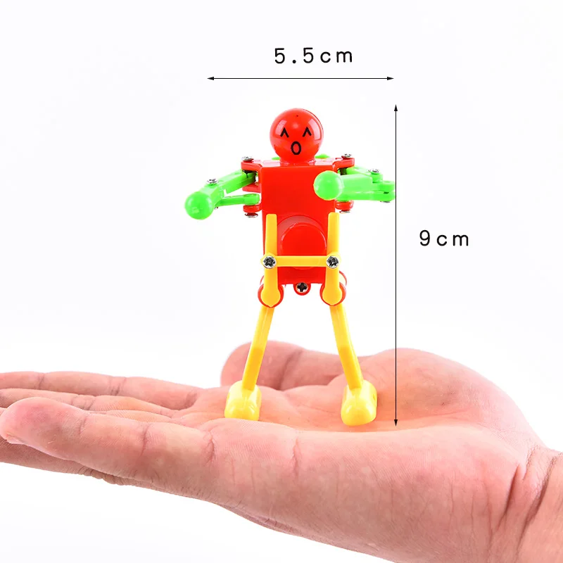 

New Classic Wind Up Toys Children Kids Plastic Clockwork Spring Wind-Up Dancing Robot Toy Gifts Random color