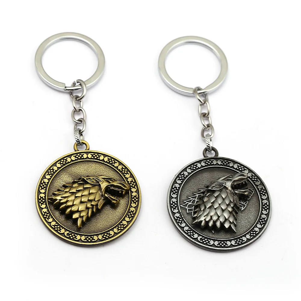 

Game of Throne Keychain House of Stark Winter is Coming A Song of Ice and Fire Key Chain Metal Rotatable Wolf Pendant Key Ring