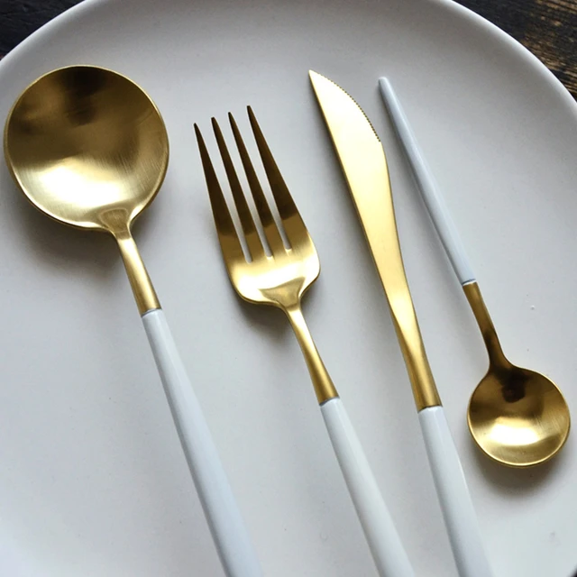 Gold Flatware Set With White Handle