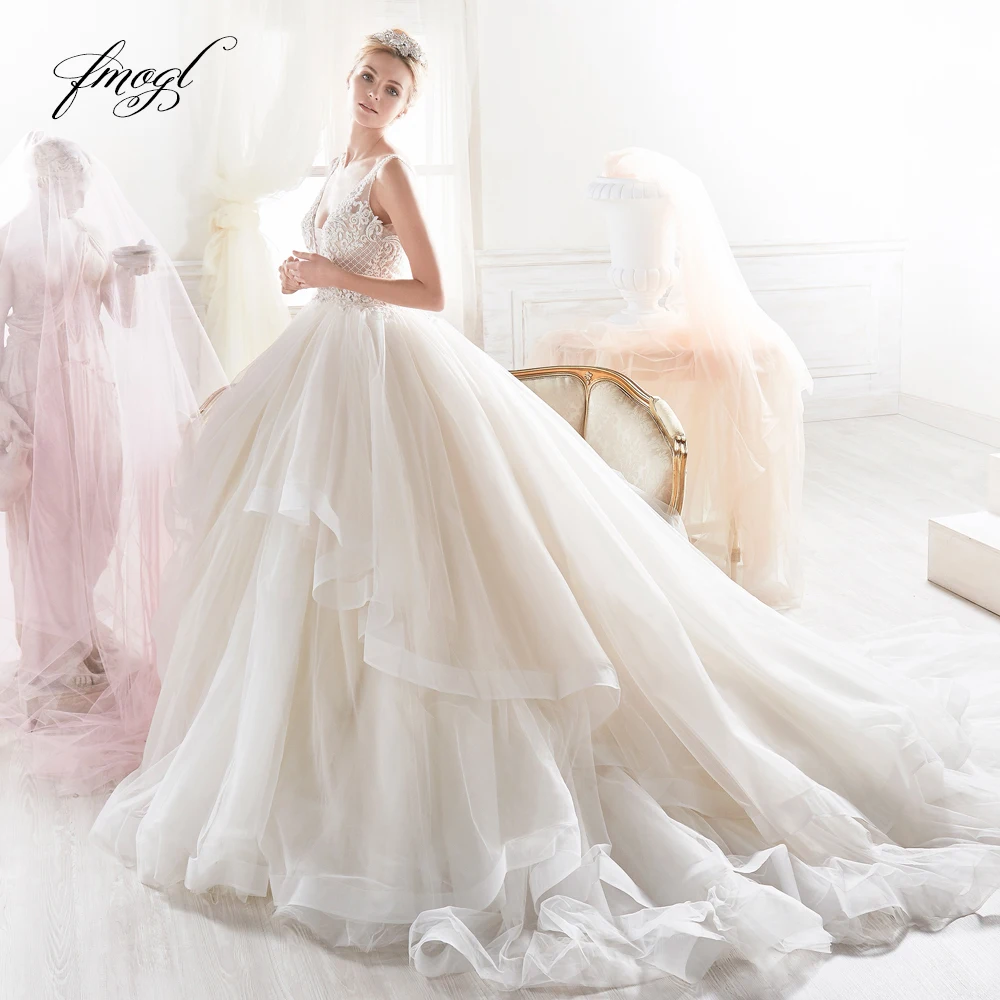 

Fmogl Vestido De Noiva Sexy Backless A Line Wedding Dress 2019 V Neck Spaghetti Straps Appliques Beaded Ruffles Bride Gown