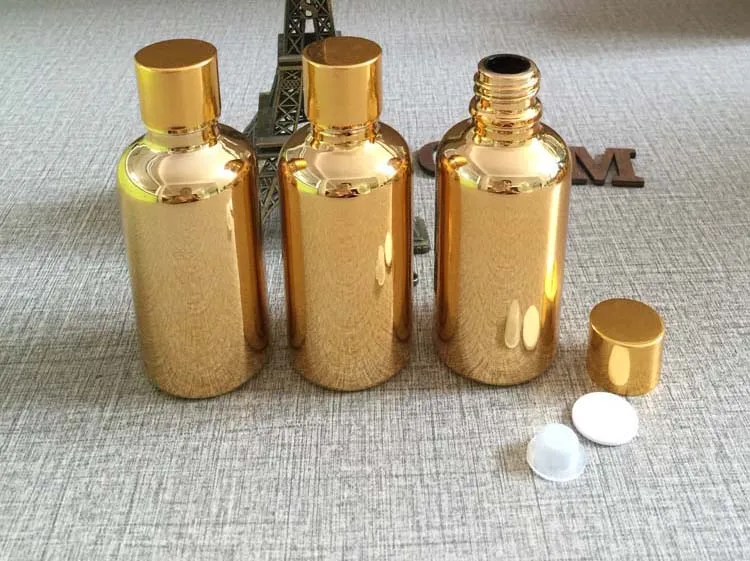 

high grade 50ml golden essential oils in glass bottles for sale , wholesale round empty golden 50 ml glass dropper bottle bulk