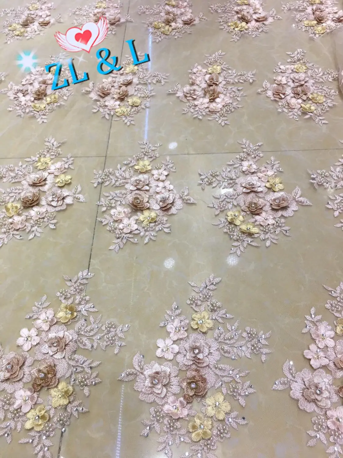 

High quality hand-embroidered beaded diamond pattern African Nigeria lace fabric French net for ladies wedding dress