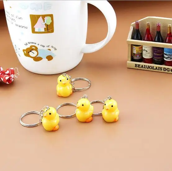 

50Pcs Little duck Keychain Cute Anime Cartoon Toy Key Ring children party gift WW778