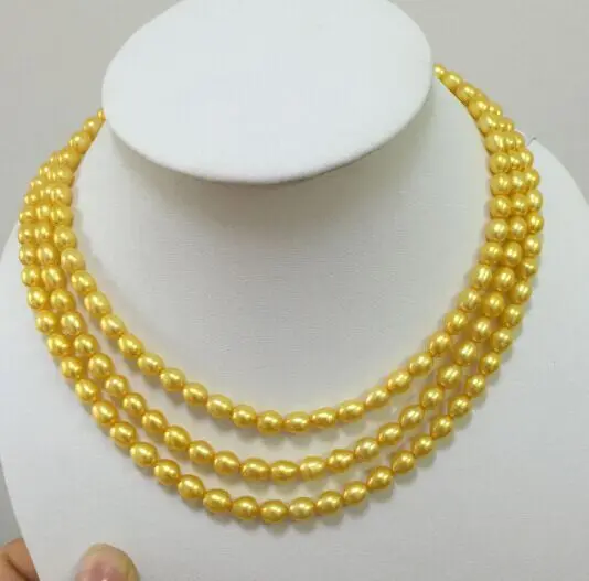 

ELEGANT SOUTH SEA SEED NATURAL GOLD PEARL NECKLACE 45NCH14KGP