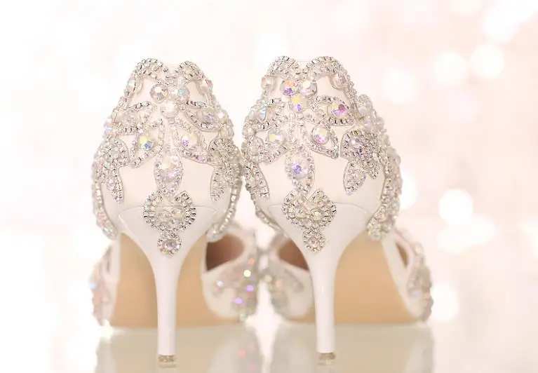 Spring and summer new fashion water drill fine heel side empty pointed high heel wedding shoes Spring and summer new fashion water drill fine heel side empty pointed high heel wedding shoes