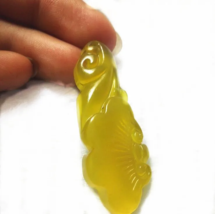 

natural Ice of Xiuyan jade Single side carving small Ruyi pendant Xiu jade yellow Ruyi agate jade pendant