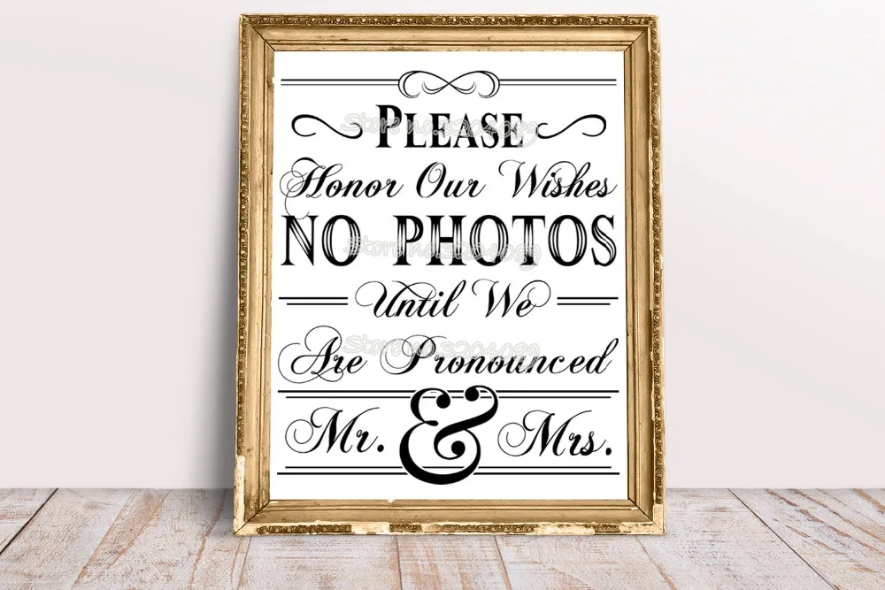 Wedding sign board sticker featuring a no photos message