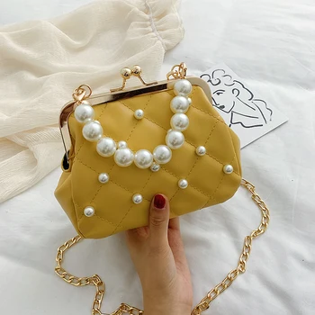 

2019 fashion simple shell bag women's designer handbag high quality PU leather rivet single shoulder diagonal straddle bag qq449