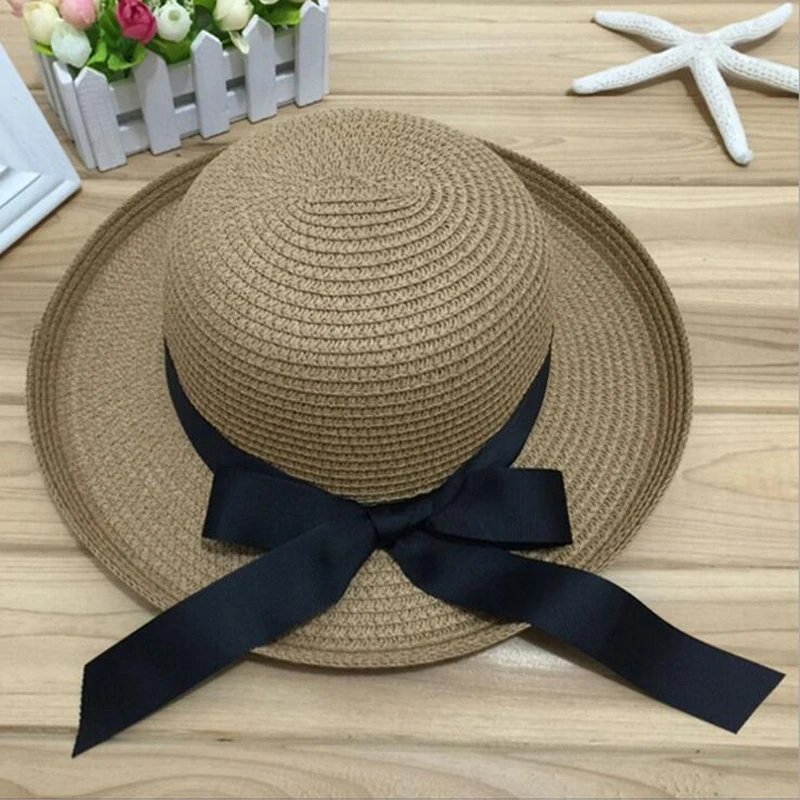 1 قطعة الصيف جديد المرأة قبعة الشمس الأسود Bowknot الشريط التشفيه القش قبعة الشاطئ قبعات محيط الرأس 56-58 سنتيمتر 3 ألوان