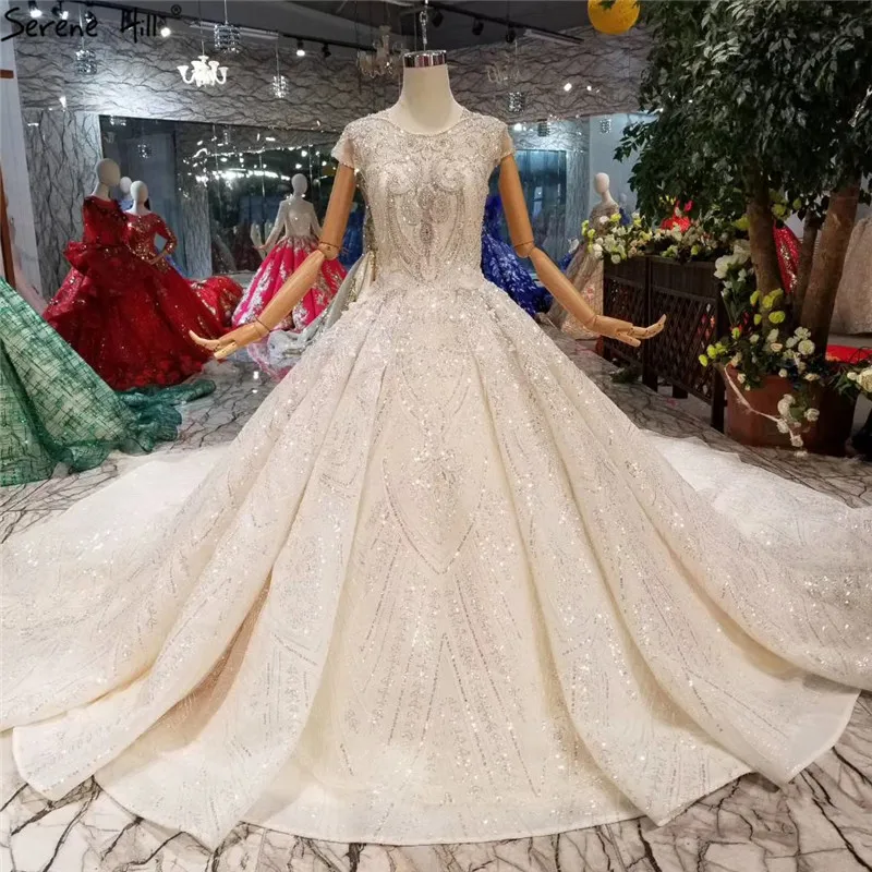 

Luxury Sequined Sparkle Sexy Wedding Dresses 2019 Vintage Sleeveless Big Train Bride Wedding Gowns Real Photo Custom Made