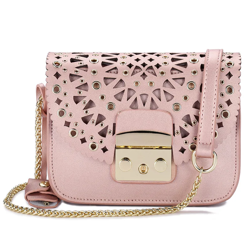 

Women's fashion personality hollow lock Messenger bag Korean version of the vertical square shoulder leather small bag