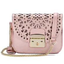 Women's fashion personality hollow lock Messenger bag Korean version of the vertical square shoulder leather small bag