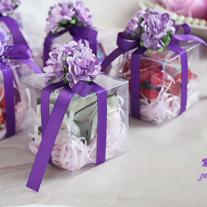 

New 6*6*6cm 48pcs Clear Plastic PVC Candy Box with Ribbon Paper Flower for Event Party Favors Souvenir Cookies Storage