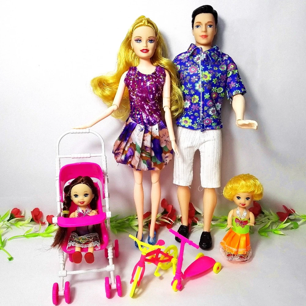 little girl playing with barbies