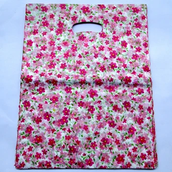 

100pcs/bag 25*20cm lot of beautiful flowers pattern Plastic Jewelry Gift bag Beautiful Plastic Shopping Bags Recyclable 2537