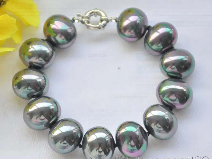 

Hot sale new Style >>>>> 8inch PEACOCK BLACK 20mm EGG SOUTH SEA SHELL PEARL BRACELET