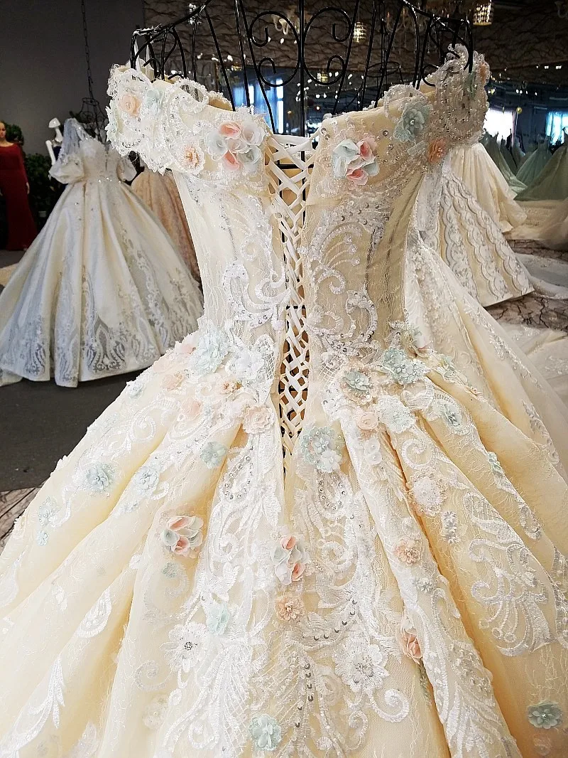 2018 шампанское натуральный белый кружево Свадебные платья без рукавов Длинный Шлейф волны бальное платье Свадебные платья Trouwjurk Vestido De Noiva