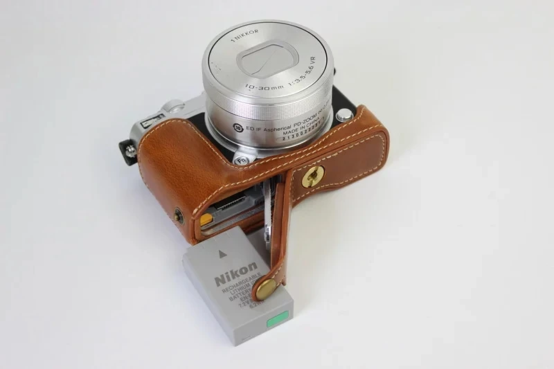Камера машина для заделки дна чехол для цифровых зеркальных фотокамер Nikon 1 J5 1J5 из искусственной кожи половина тела набор крышка с батарейным отсеком