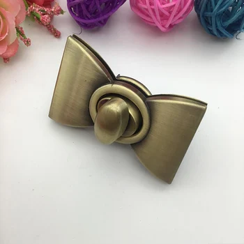 

High quality Bowknot Shape Clasp Turn Locks Twist Lock DIY Leather Handbag Bag Hardware Bags Accessories Bronze