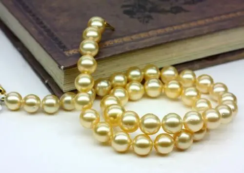 

Free Shipping >>>>> elegant 9-10mm round AAA south sea gold pearl necklace 18INCH SILVER CLASP