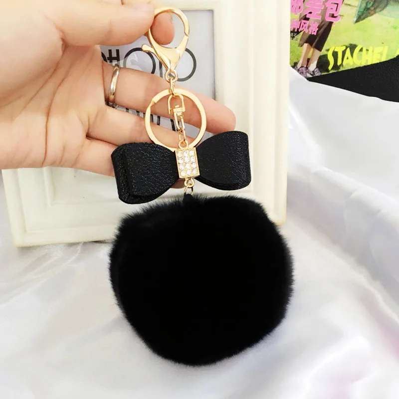 

2017 Creative Trinket Leather PU Bow Tie Keychain 8cm Fluffy Fur Pom Pom Keychain Pompons Keyring Key Chains Bag Charm Pendant