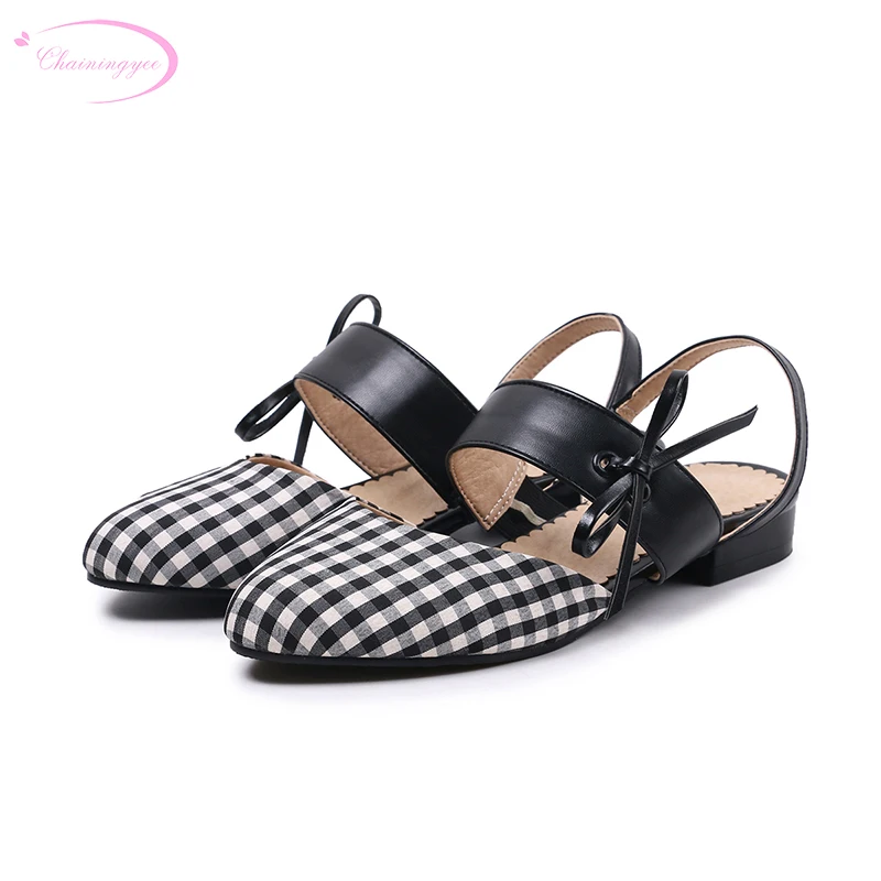 

Chainingyee college party style summer cool sandals fashion bowknot fretwork color matching black low heel women's shoes
