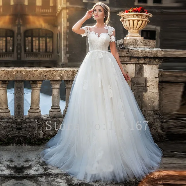 2017 recién llegado de una línea de vestidos de novia de manga corta