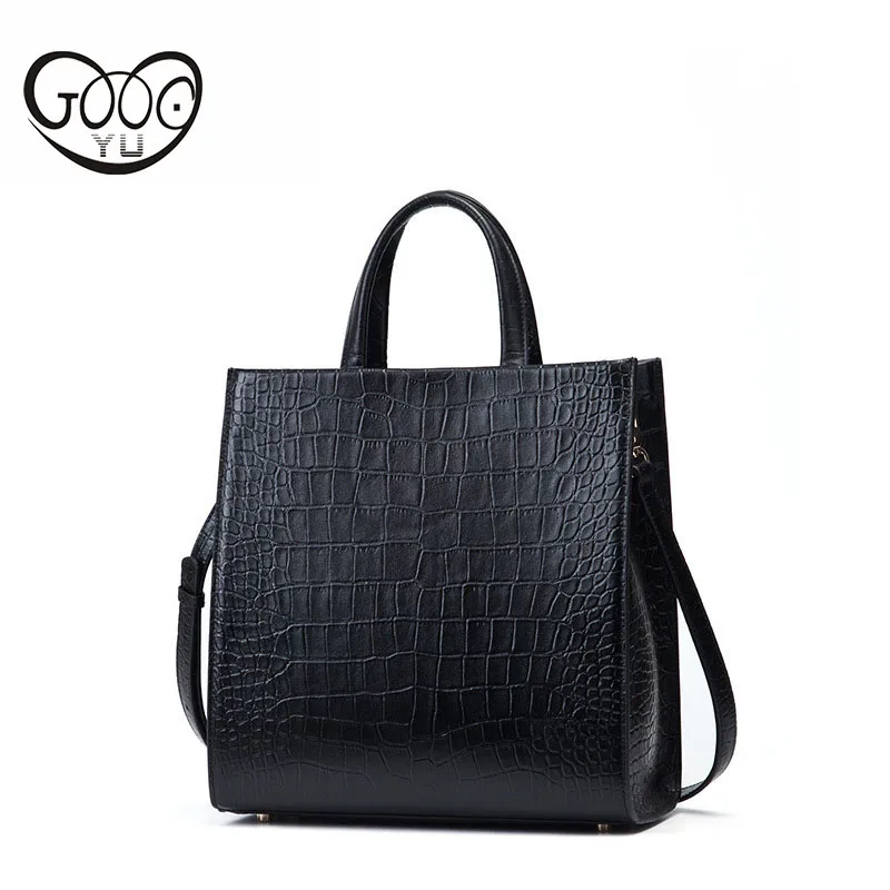 

Europe and the United States style simple crocodile pattern layer of cattle leather Tuo Tu package vertical paragraph multi-colo