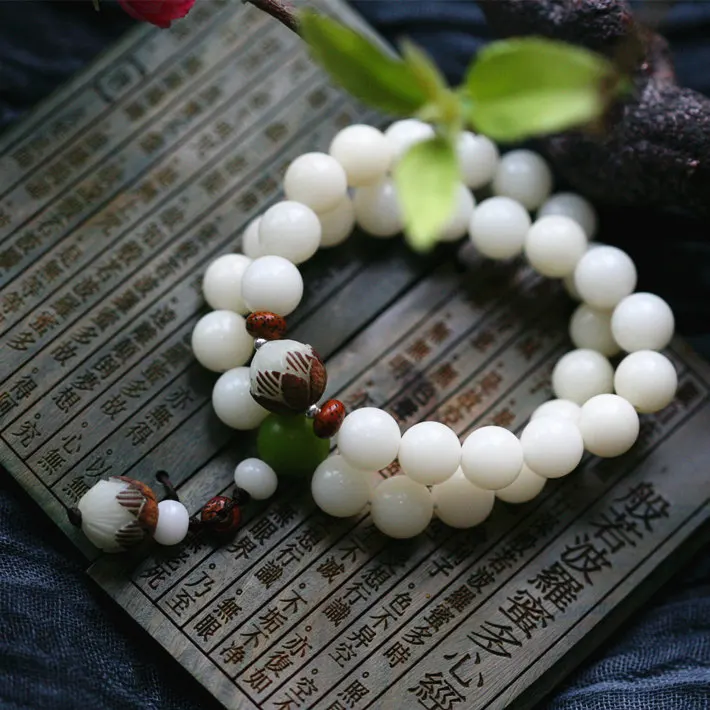

White jade Buddha hand string bracelet bracelet root wood beads Bodhi sub hand on